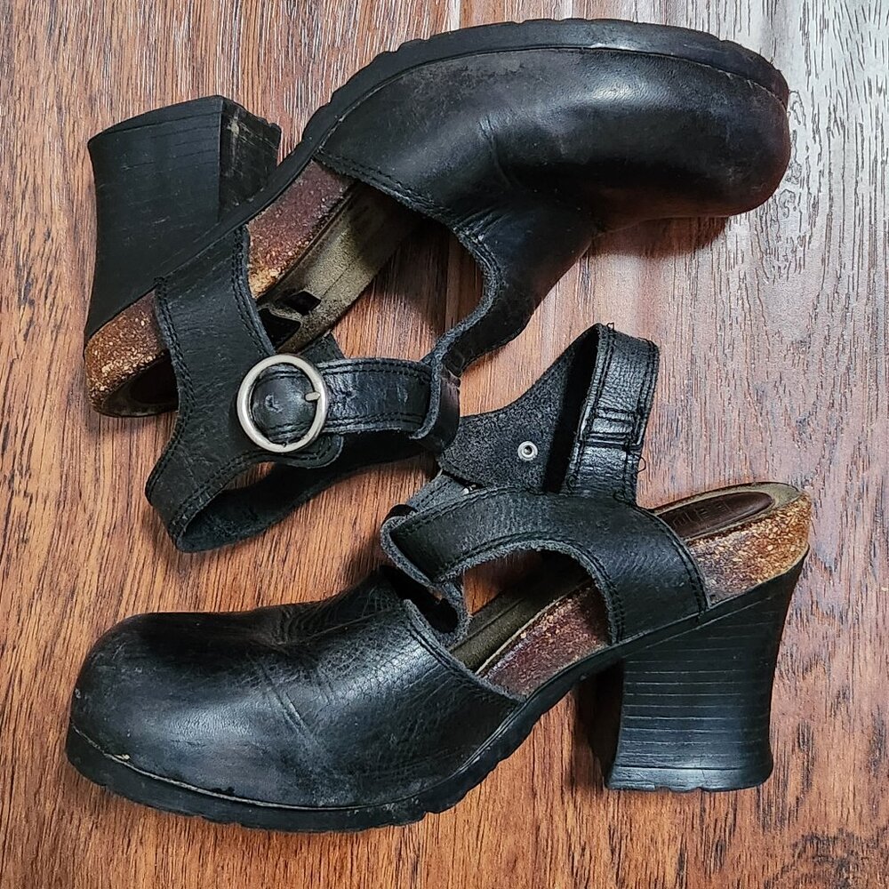 Leather clogs with rubber soles